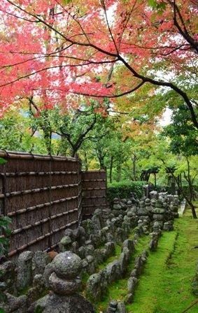 Kyoto Arashiyama Arashion Temple gravestones & red tree